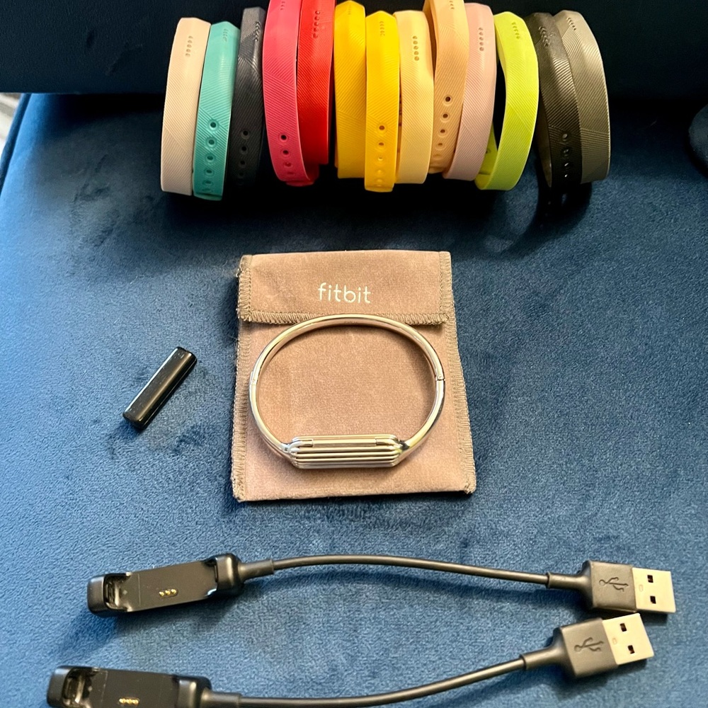 FITBIT FLEX 2 WITH  (2) CHARGING CABLES, 13 MULTI COLOR BANDS, AND SILVER BANGLE